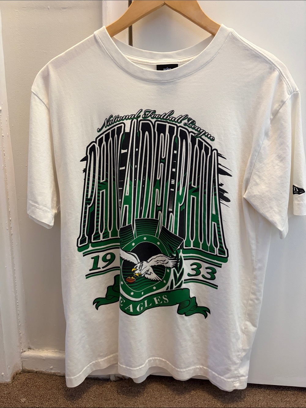 New Era White Philadelphia Graphic Tee with Green and Black Accents